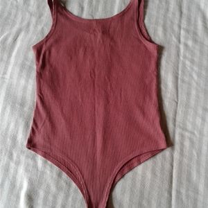 Muave/burnt pink onesie snap closure sz sm. FREE WITH PURCHASE